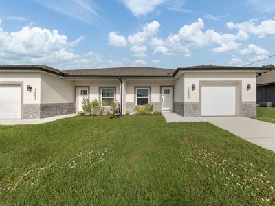 12554 Buffing Road, Home with 9 bedrooms, 6 bathrooms and null parking in PORT CHARLOTTE FL | Image 1