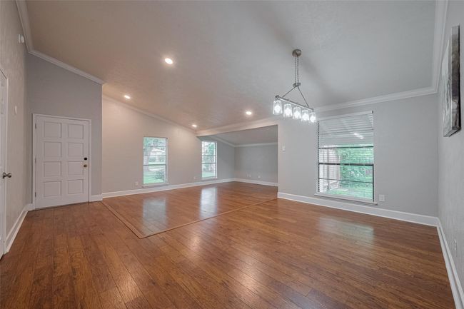 View from dining area looking back towards the front door and living area | Image 6