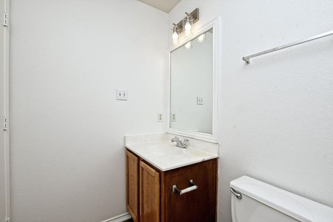 Half bathroom with toilet and vanity | Image 19