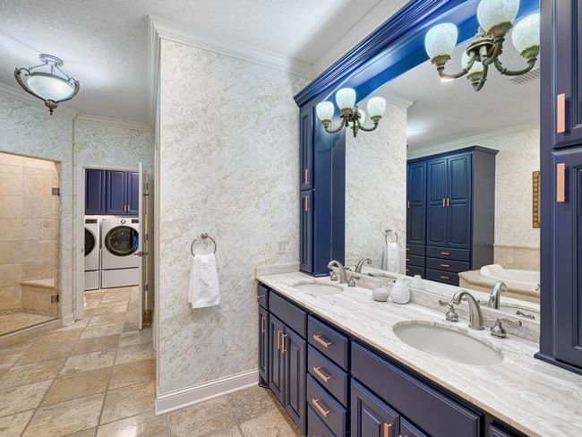 Primary bath has easy access to the laundry room | Image 20