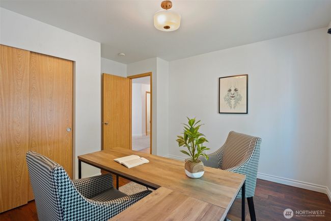 A second view of the 3rd bedroom, looks towards the entry, that's the laundry room door you can see | Image 24
