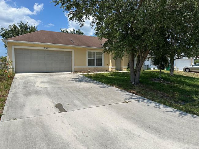 885 Sw Sultan Dr Drive, House other with 3 bedrooms, 2 bathrooms and null parking in Port St Lucie FL | Image 3