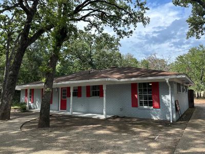 View of ranch-style house | Image 1