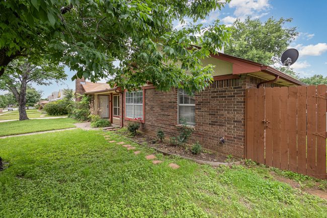 View of home's exterior featuring a yard and brick siding | Image 7