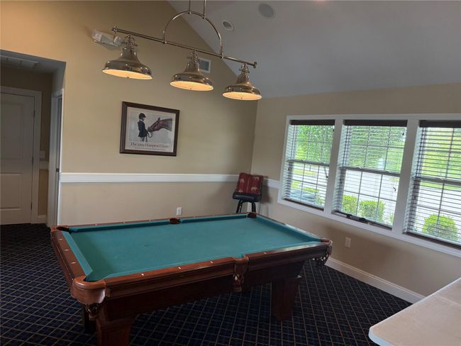 Rec room featuring carpet flooring, pool table, and baseboards | Image 22