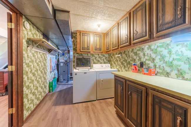 Laundry room in walk out basement #2 | Image 23