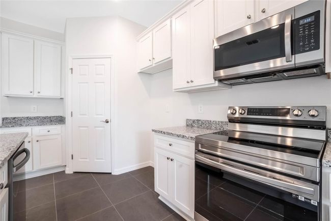 8928 Nuthatcher Dr, House other with 3 bedrooms, 2 bathrooms and null parking in LEESBURG FL | Image 24