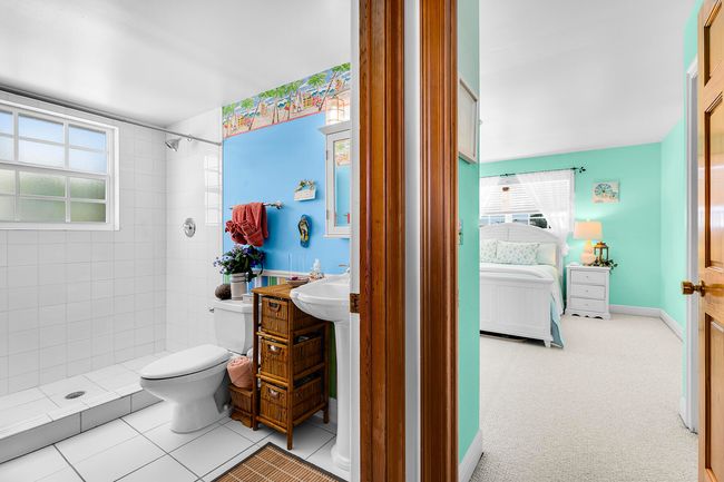 Main bath in living area | Image 38