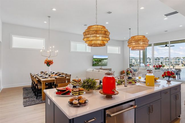 Kitchen featuring GE Café stainless appliances. | Image 14