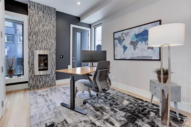 Non-conforming 3rd bed or office with floor to ceiling tile fireplace | Image 39