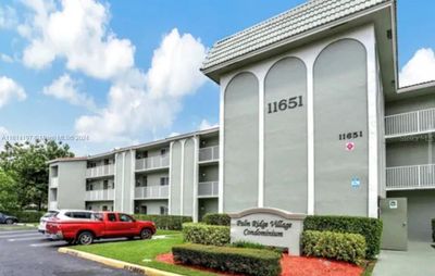 303 - 11651 Royal Palm Boulevard, Condo with 2 bedrooms, 2 bathrooms and null parking in Coral Springs FL | Image 1