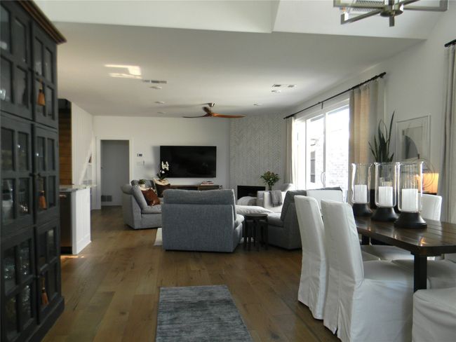 Entry from front door just off dining area with full open concept living | Image 4