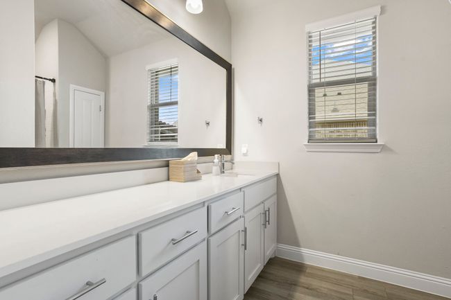 Bathroom featuring vanity and wood finished floors | Image 13