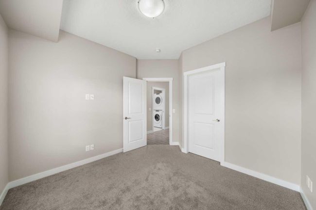 915 Cranbrook Walk Se, Home with 2 bedrooms, 1 bathrooms and 1 parking in Calgary AB | Image 12