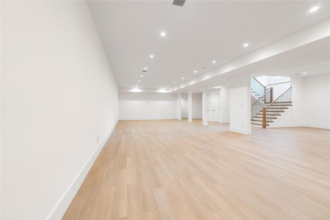 Below grade area with stairs, recessed lighting, baseboards, and light wood finished floors | Image 38
