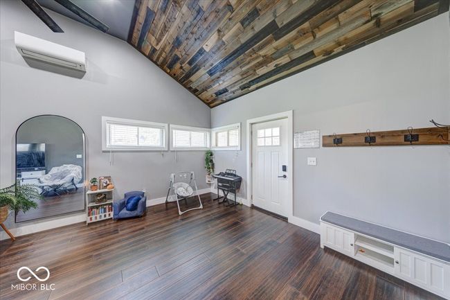 doorway enters onto the front covered patio | Image 13