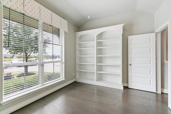 2nd Bedroom in Front of House has Built In Shelves and can also be used as a Study. | Image 21