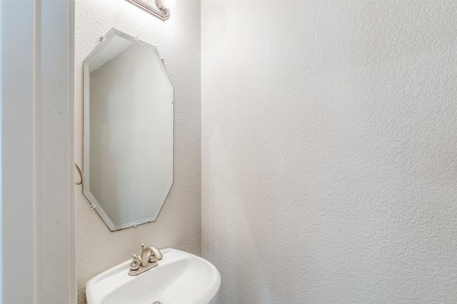 Bathroom featuring a sink | Image 12