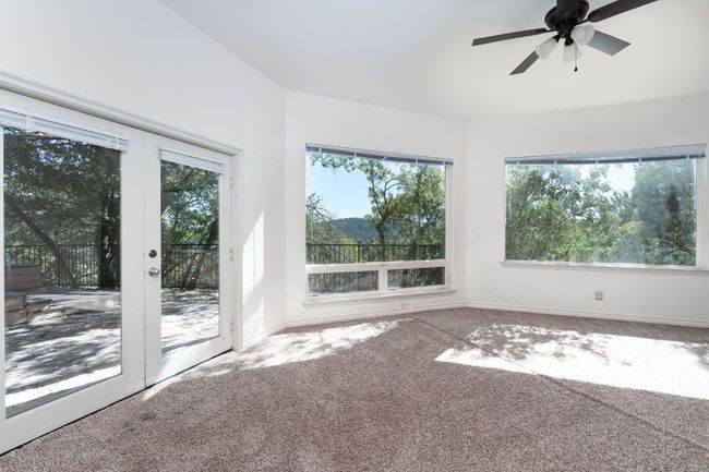 This downstairs room has access to two exterior patios. Which could make this room great for entertaining. | Image 20