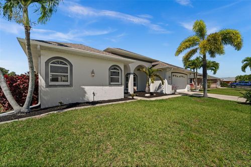 410 Se 20th Ct, Cape Coral, FL, 33990-7704 | Card Image