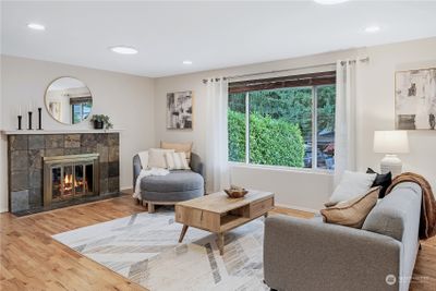 The entry and living room are south facing. Combine that with the 2 solar tubes in the living room and this room is just drenched in sunlight. | Image 3