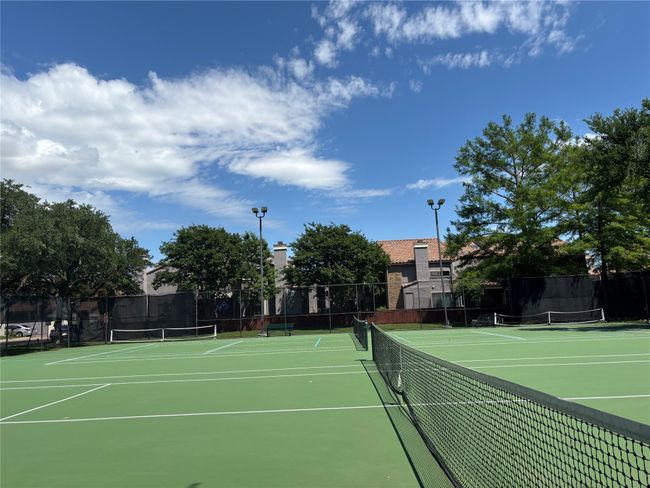 View of sport court featuring fence and community basketball court | Image 19