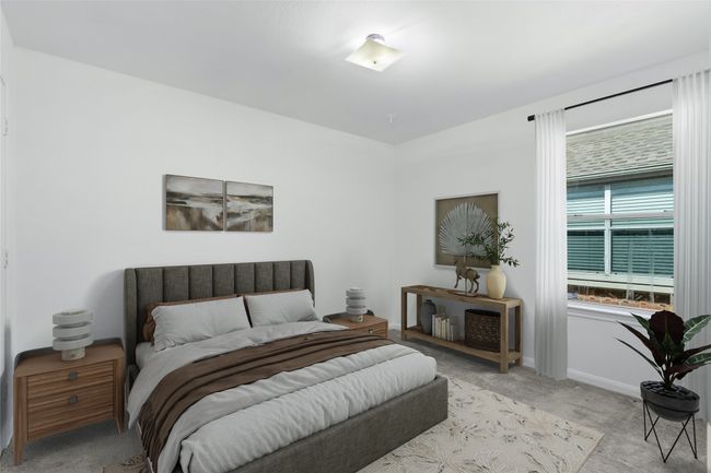 Bedroom featuring light colored carpet and baseboards | Image 21