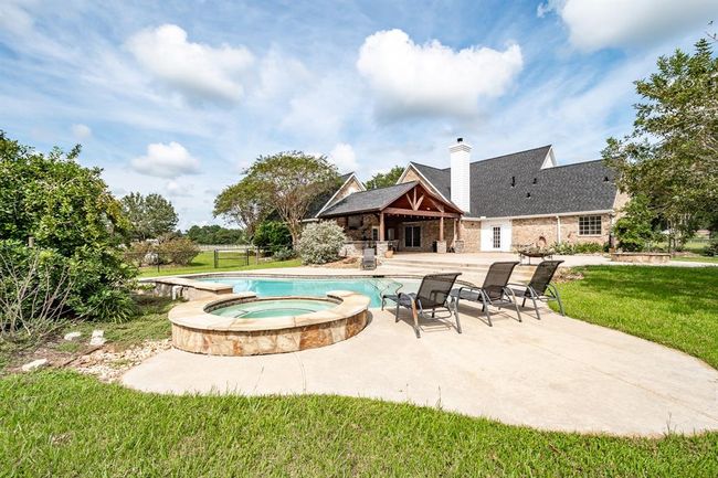 402 Cs Harmon Rd, Home with 4 bedrooms, 4 bathrooms and 2 parking in Hankamer TX | Image 29