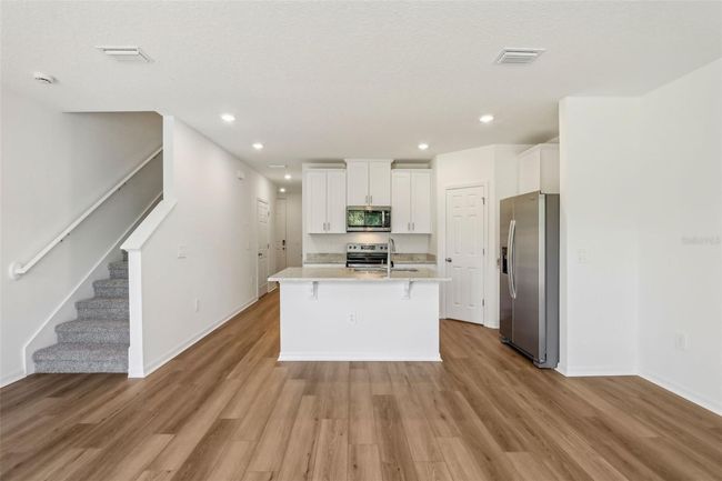 16419 Bird Of Paradise Ave, Townhouse with 3 bedrooms, 3 bathrooms and null parking in CLERMONT FL | Image 6