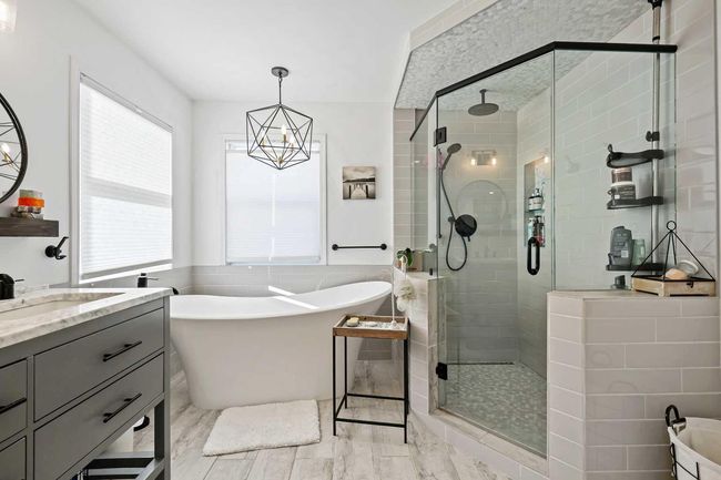 716 Boulder Creek Drive Se, House other with 4 bedrooms, 4 bathrooms and 4 parking in Langdon AB | Image 24