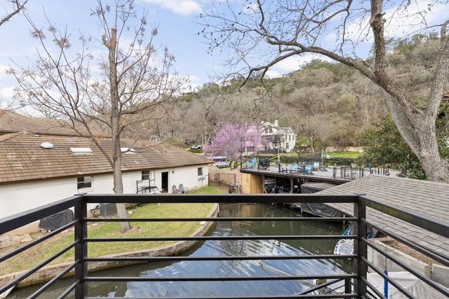 Upstairs Bedroom Balcony View of Canal | Image 21