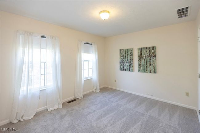 Bedroom #3 is spacious and neutral for any guest or family member! | Image 25