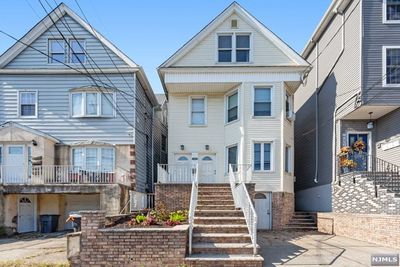 663 Avenue E, Home with 5 bedrooms, 3 bathrooms and null parking in Bayonne NJ | Image 1