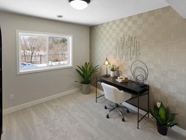 The 5th bedroom in the lower level, measuring 10x10, offers a private and comfortable space, ideal for guests, a home office, or additional living quarters. | Image 41