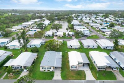 Aerial of the front elevation showing the lot size and surrounding properties. | Image 2