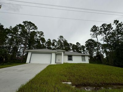 3418 W 51st St, House other with 3 bedrooms, 2 bathrooms and null parking in Lehigh Acres FL | Image 1