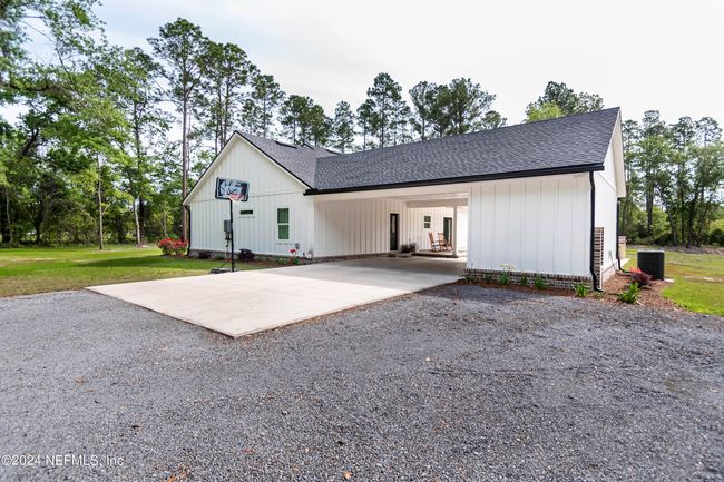 7052 Cottontail Ln, House other with 4 bedrooms, 3 bathrooms and null parking in GLEN ST. MARY FL | Image 65
