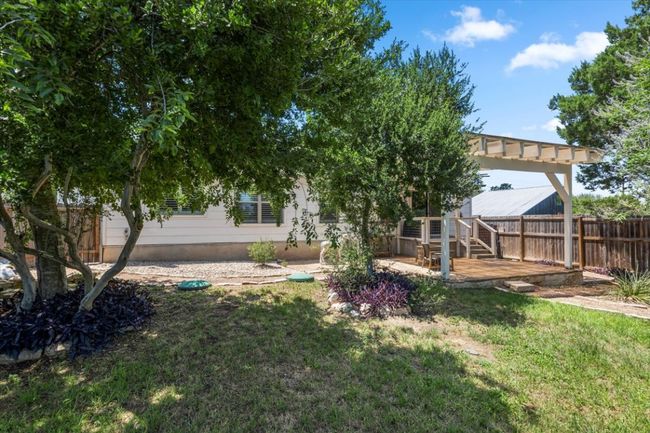 View of yard with a patio area and a pergola | Image 35