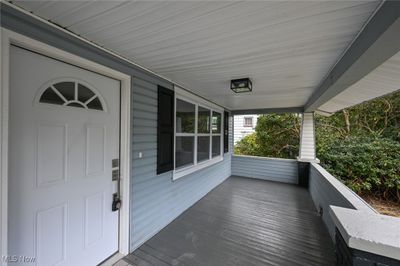 Wooden deck featuring covered porch | Image 3