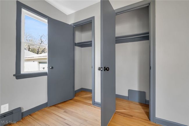 two closets in one first floor bedroom | Image 11