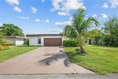 7010 Nw 63rd St, House other with 4 bedrooms, 2 bathrooms and null parking in Tamarac FL | Image 1