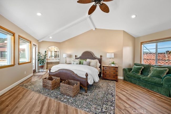 The upstairs primary suite is luxurious and light filled | Image 31