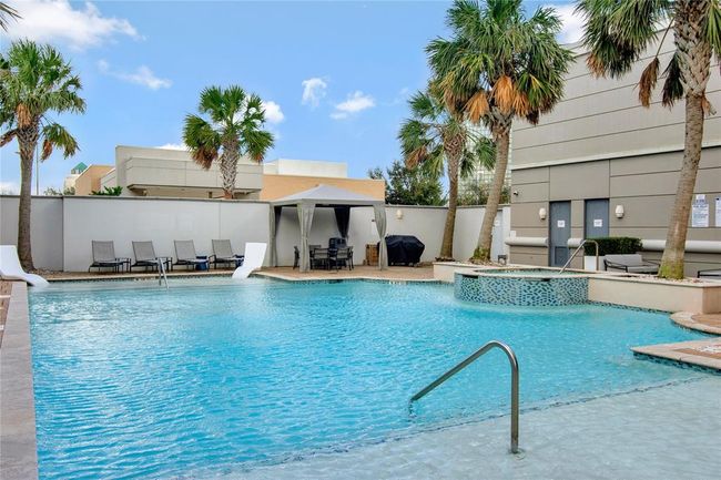 Another amenity is the pool with a cabana and hot tub! | Image 37