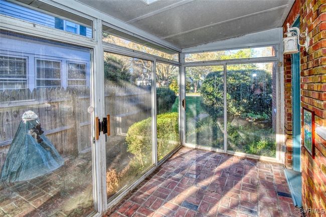 View of unfurnished sunroom | Image 6