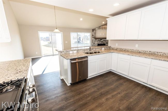 Chestnut Kitchen Open to Fireplace | Image 9