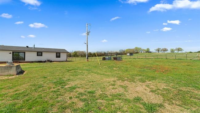 View of yard featuring fence | Image 19