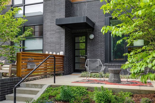 Established, low maintenance landscaping frame both the front and back patios. | Image 4