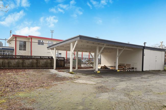 View of parking with a carport and fence | Image 30