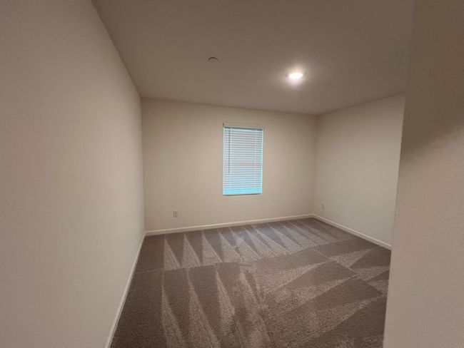 Carpeted empty room with baseboards and recessed lighting | Image 21