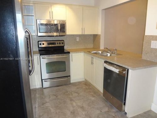 2037-452 Ne 210th Circle Ter, Miami, FL, 33179-1739 | Card Image